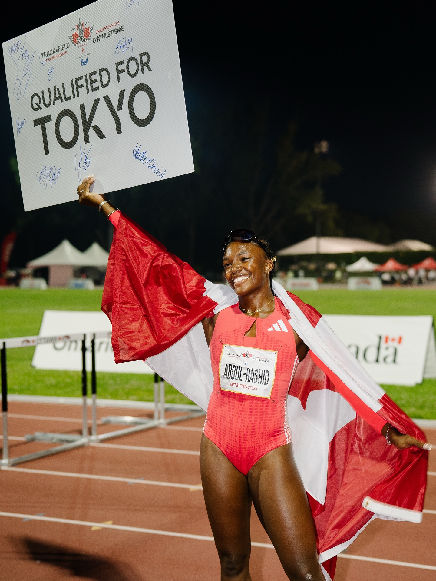 Mariam Abdul-Rashid smiling off the track